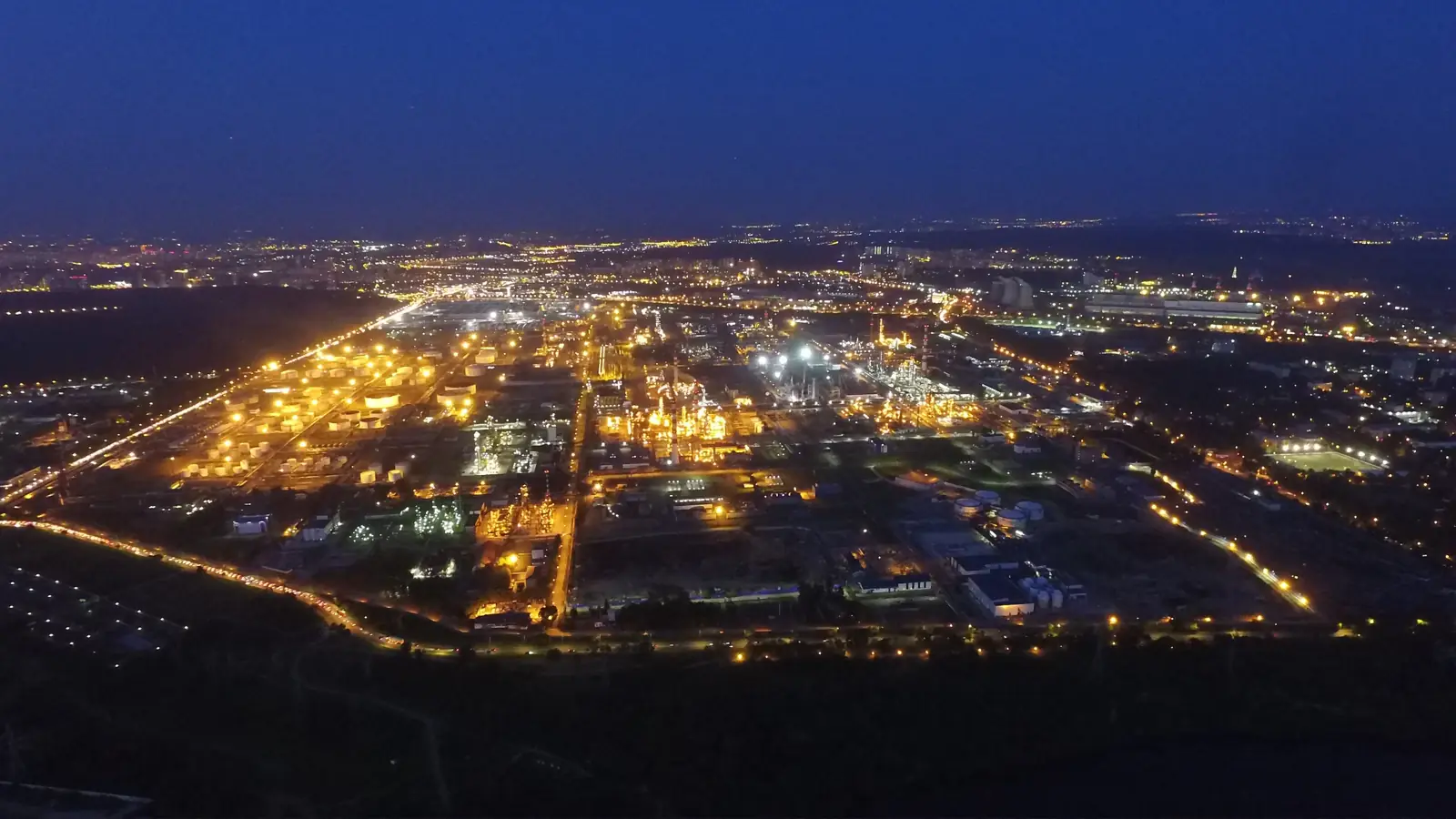 An oil refinery lit up at night